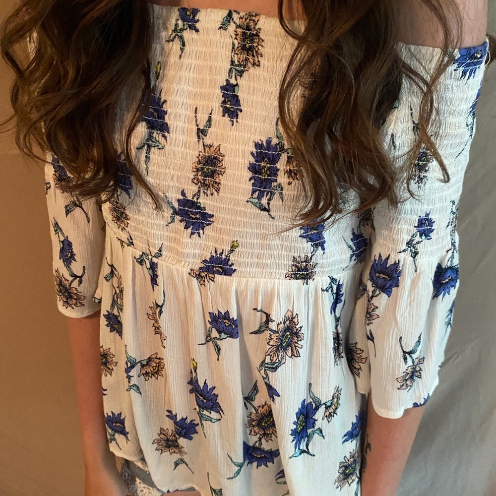 White flower off the shoulder top